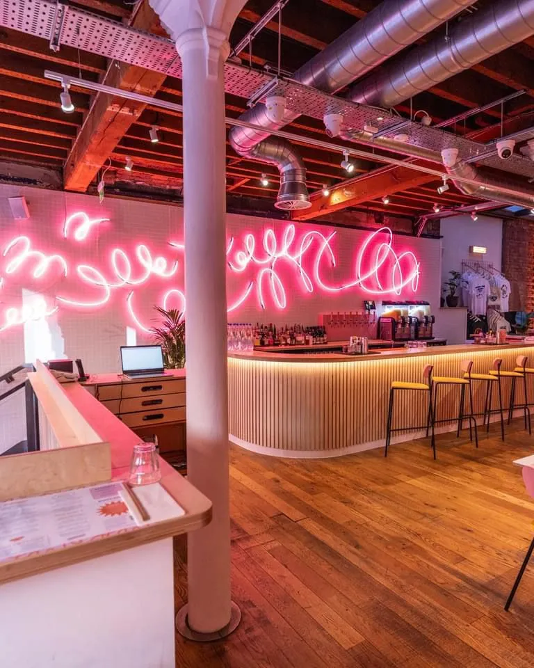 bar with flourescent pink light effects