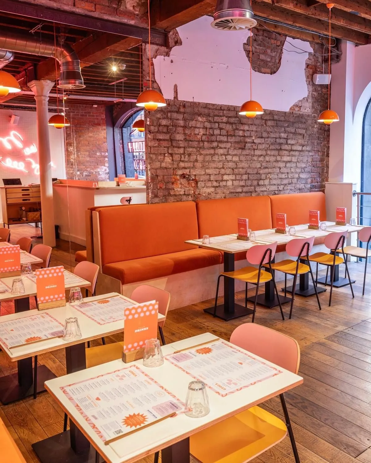 restaurant with orange chairs