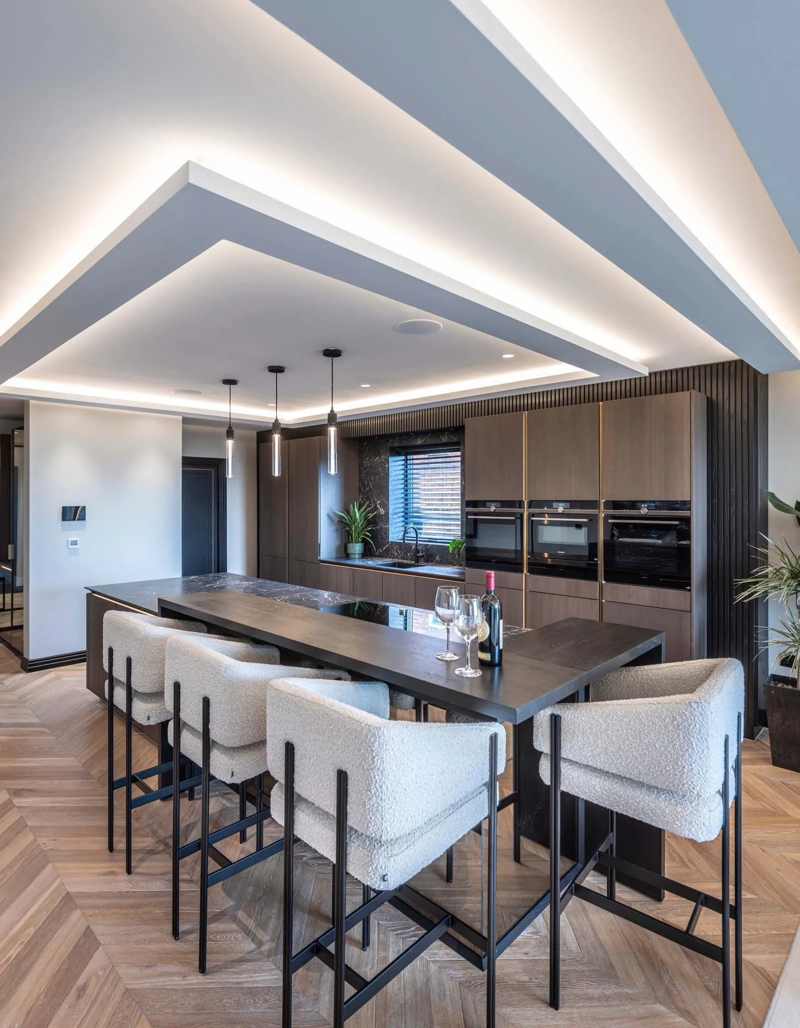kitchen with light grey chairs